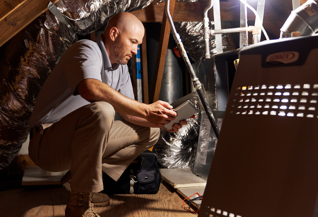 A technician assessing an HVAC system