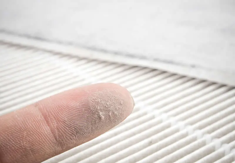 dust on finger